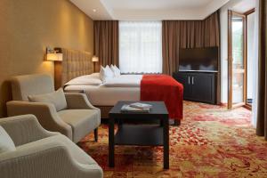 Posteľ alebo postele v izbe v ubytovaní Hotel Singer