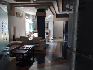 Kuchyň nebo kuchyňský kout v ubytování Continental Hotel