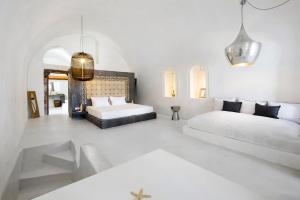 Ένα ή περισσότερα κρεβάτια σε δωμάτιο στο Sophia Luxury Suites