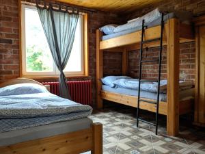Postel nebo postele na pokoji v ubytování Luxusní Apartmán v srdci Šumavy
