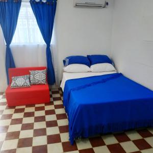 Giường trong phòng chung tại Apartamento Mattos