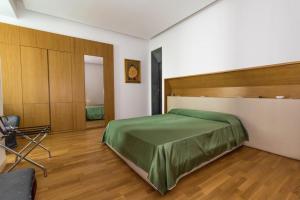 Posteľ alebo postele v izbe v ubytovaní Nerello Suites and Rooms