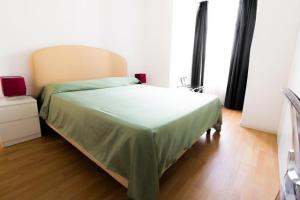 Posteľ alebo postele v izbe v ubytovaní Nerello Suites and Rooms