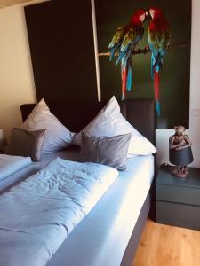 Postel nebo postele na pokoji v ubytování IchZeit Aparthotel
