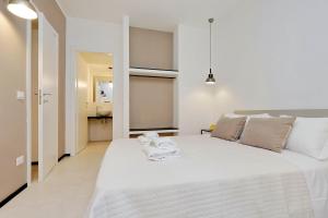 Voodi või voodid majutusasutuse Restart Accommodations Aldobrandini e Sciarra toas
