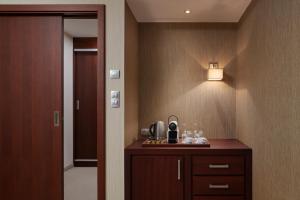 Príslušenstvo na prípravu kávy alebo čaju v ubytovaní Hotel Singer