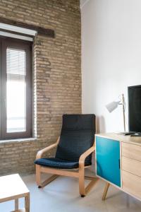 TV a/nebo společenská místnost v ubytování Almazen apartamentos, Arrayan 23