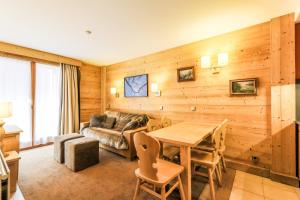 Posezení v ubytování Residence Les Chalets du Forum - maeva Home