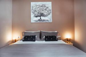 Postel nebo postele na pokoji v ubytování La corte di Silvia