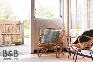 Posezení v ubytování B&B Duinbrink