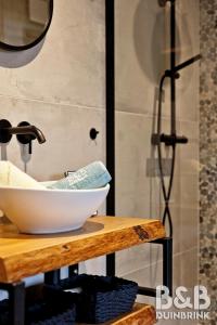 Koupelna v ubytování B&B Duinbrink + 32 fotografií