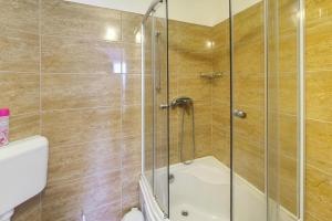 Kúpeľňa v ubytovaní Hajnalház Apartments + 33 fotografií