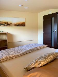 Posteľ alebo postele v izbe v ubytovaní Grand Spa Holiday Home II