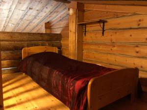 Кровать или кровати в номере Rukan Otsolanhovi