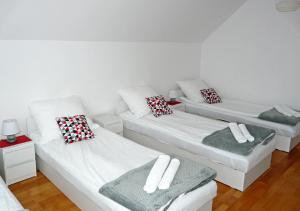 Posteľ alebo postele v izbe v ubytovaní Villa Vivian + 8 fotografií