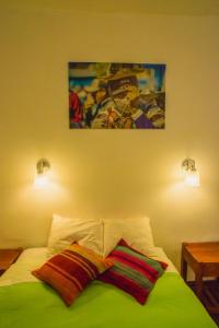 Postel nebo postele na pokoji v ubytování Tucan Hostel