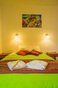 Postel nebo postele na pokoji v ubytování Tucan Hostel