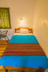 Postel nebo postele na pokoji v ubytování Tucan Hostel