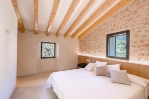 Posteľ alebo postele v izbe v ubytovaní Villa Can Batach-Nueva Construcción en Sóller