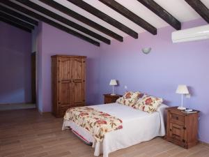 Postel nebo postele na pokoji v ubytování Casas Rurales Manolo