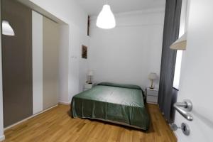 Posteľ alebo postele v izbe v ubytovaní Nerello Suites and Rooms