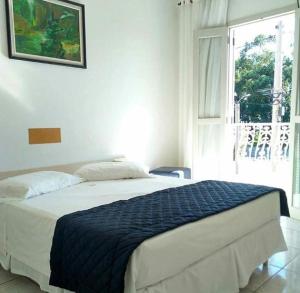 Katil atau katil-katil dalam bilik di Hotel Muralha