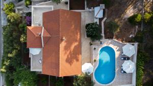 an overhead view of a house with a swimming pool at Villa Katja in Sumartin