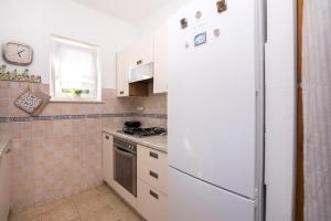 Kuchyň nebo kuchyňský kout v ubytování Villa Katja