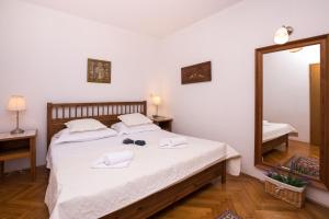 Postel nebo postele na pokoji v ubytování Villa Katja + 37 fotografií