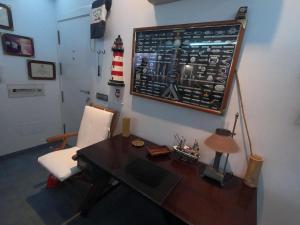 Posezení v ubytování Ático con vistas al mar + 15 fotografií