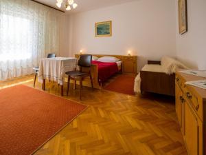 Posteľ alebo postele v izbe v ubytovaní Apartment DARINKA 1