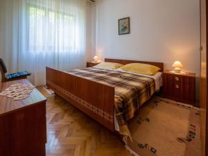 Posteľ alebo postele v izbe v ubytovaní Apartment DARINKA 1