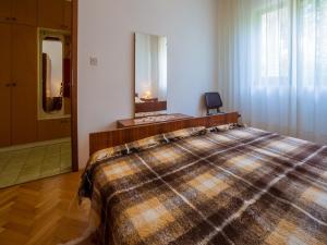 Posteľ alebo postele v izbe v ubytovaní Apartment DARINKA 1