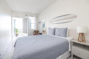 Postel nebo postele na pokoji v ubytování Beach House Rincon + 34 fotografií