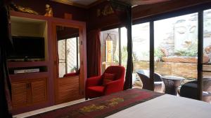 Postel nebo postele na pokoji v ubytování LePrive Resort