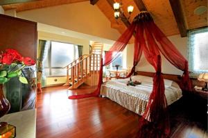 Postel nebo postele na pokoji v ubytování Dream Forest Villa