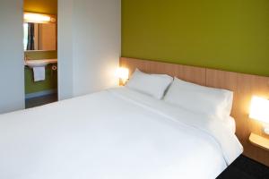 Postel nebo postele na pokoji v ubytování B&B HOTEL Brive-la-Gaillarde