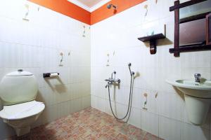 Et badeværelse på Kondai Lip Backwater Heritage Resort
