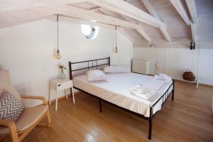 Posteľ alebo postele v izbe v ubytovaní LAURA_SEA VIEW_HOUSE + 26 fotografií