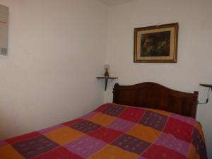 Postel nebo postele na pokoji v ubytování LES MELEZES 267