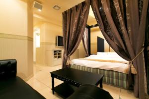 Postel nebo postele na pokoji v ubytování Hotel Luna (Adult Only)