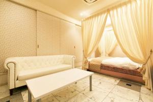Postel nebo postele na pokoji v ubytování Hotel Luna (Adult Only)