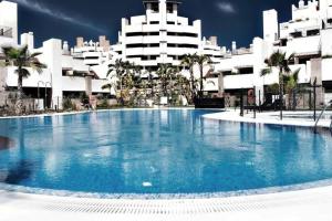 The swimming pool at or close to 110 - Beach Two-Bedroom Apartment