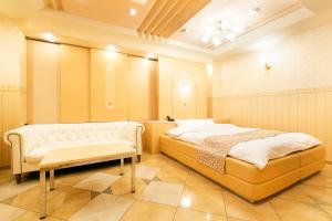 Postel nebo postele na pokoji v ubytování Hotel Luna (Adult Only)