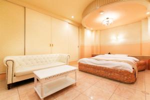 Postel nebo postele na pokoji v ubytování Hotel Luna (Adult Only)