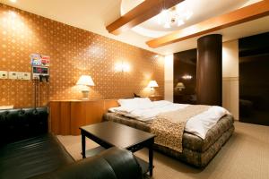 Postel nebo postele na pokoji v ubytování Hotel Luna (Adult Only)