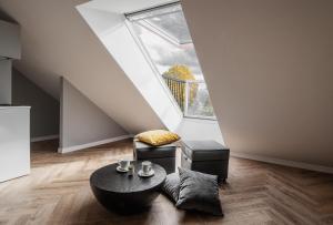 Posezení v ubytování Jono kalnelis Apartments