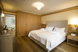 Ένα ή περισσότερα κρεβάτια σε δωμάτιο στο Hotel Lorenzetti