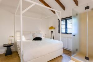 Postel nebo postele na pokoji v ubytování Villa Galilee Boutique Hotel and Spa + 48 fotografií