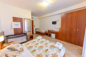 Postel nebo postele na pokoji v ubytování B&B Anna Lungomare